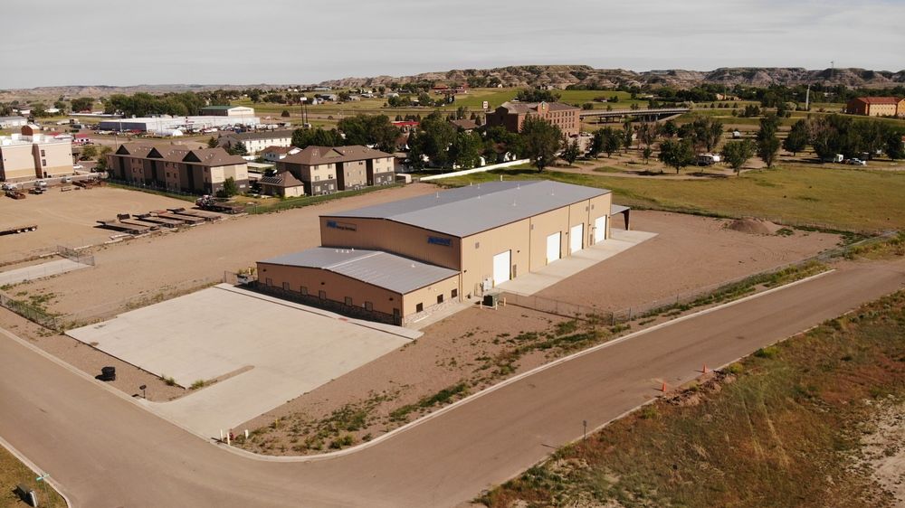 Functional +/-18,000+ SQ FT Shop on 3.11 Acres in Glendive, MT: 123 W Oregon Ln, Glendive, MT 59330
